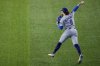 Los Angeles Dodgers' Enrique Hernández (8) throws to second to force out Toronto Blue Jays' Addison Barger to end Game 6 of baseball's World Series, Friday, Oct. 31, 2025, in Toronto. (AP Photo/Ashley Landis)