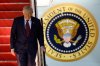 President Donald Trump walks down the stairs of Air Force One upon his arrival at Joint Base Andrews, Md., Wednesday, Nov. 5, 2025, after giving a speech at the American Business Forum in Miami. (AP Photo/Luis M. Alvarez)