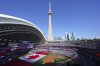 The Canadian flag is displayed on the field during an anthem ceremony ahead of the start of Major League Baseball's American League Division Series between the Blue Jays and New York Yankees in Toronto on Oct. 4, 2025. THE CANADIAN PRESS/Chris Young