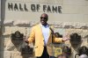FILE - Former Pittsburgh Pirates outfielder Barry Bonds acknowledges the crowd during a ceremony for players that are part of the team's 2024 Hall of Fame class before a baseball game against the Cincinnati Reds in Pittsburgh, Saturday, Aug. 24, 2024. (AP Photo/Barry Reeger, File)