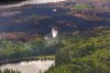 A helicopter crew works on a wildfire in northern Manitoba during a helicopter tour in the surrounding area of Flin Flon, Man., on Thursday, June 12, 2025. THE CANADIAN PRESS/Mike Deal-Pool