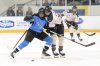Montreal's Marie-Philip Poulin (right) battles for the puck with Toronto's Renata Fast  during first period PWHL hockey action, in Toronto, on Friday, March 8, 2024.THE CANADIAN PRESS/Chris Young
