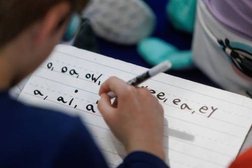 MIKE DEAL / FREE PRESS FILES
                                Grade 2 student, Hank Friesen-LeDrew, 8, writes on a small whiteboard during his daily reading comprehension period in Makayla Specaluk&rsquo;s Winnipeg Beach School grade 2 class Thursday morning. Gimli-based Evergreen School Division is radically changing the way its teachers instruct students how to read. The return-to-basics program is taking place amid a controversial debate about reading instruction (structured literacy versus balanced literacy) across Manitoba and Canada at large. Reporter: Maggie Macintosh 250123 - Thursday, January 23, 2025.