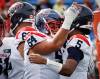 Jeff McIntosh / THE CANADIAN PRESS FILES
                                Montreal Alouettes&rsquo; Justin Lawrence (centre) celebrates a touchdown.