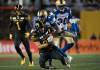 NATHAN DENETTE / THE CANADIAN PRESS FILES
                                Winnipeg Blue Bombers&rsquo; Brandon Alexander tackles Hamilton Tiger-Cats&rsquo; Jaelon Acklin during second half action of the 107th Grey Cup.