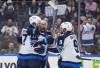 Winnipeg Jets&rsquo; Adam Lowry, front left to right, Nino Niederreiter and Alex Iafallo celebrate Niederreiter&rsquo;s goal against the Vancouver Canucks during the first period of an NHL hockey game, in Vancouver, on Tuesday, November 11, 2025. (Darryl Dyck / The Canadian Press)