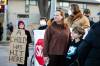 MIKAELA MACKENZIE / FREE PRESS
                                Crystal Adams with 10-year-old son, Jakob, rallying for upgraded infrastructure at Osborne Street and Brandon Avenue on Thursday.