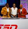 John Woods / THE CANADIAN PRESS
                                Trey Vaval (centre) celebrates with television hosts Henoc Muamba (left) and Davis Sanchez on Thursday after being named the CFL&rsquo;s Most Outstanding Special Teams Player.