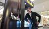Ruth Bonneville / Free Press BIZ - Freedom Mobile Pierre Karl Peladeau, CEO of Quebecor, is in Winnipeg for launch of Quebecor-owned Freedom Mobile service in Manitoba. Peladeau officially opened the Freedom Mobile kiosk in Polo Park mall with staff at ribbon -cutting Thursday. See story by Martin Cash June 6th, 2024