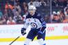 Matt Slocum / THE ASSOCIATED PRESS FILES
                                Winnipeg Jets captain Adam Lowry signed a five-year contract extension Wednesday with the club.