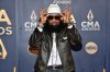 FILE - Blanco Brown arrives at the 58th Annual CMA Awards on Wednesday, Nov. 20, 2024, at Bridgestone Arena in Nashville, Tenn. (Photo by Evan Agostini/Invision/AP, File)