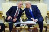 U.S. President Donald Trump meets with Canadian Prime Minister Mark Carney in the Oval Office of the White House on Tuesday, Oct. 7, 2025, in Washington. (AP Photo/Evan Vucci)