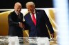President Donald Trump is greeted by FIFA President Gianni Infantino during the draw for the 2026 soccer World Cup at the Kennedy Center in Washington, Friday, Dec. 5, 2025. (Jia Haocheng/Pool Photo via AP)