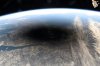 FILE - This photo provided by NASA shows the Moon's shadow covering portions of Canada and the U.S. during a total solar eclipse as seen from the International Space Station on Monday, Aug. 8, 2024. (NASA via AP, File)
