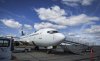 A WestJet plane on the tarmac at Yellowknife Airport on Tuesday, July 22, 2025. THE CANADIAN PRESS/Jeff McIntosh