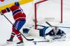 Christopher Katsarov / THE CANADIAN PRESS
                                Winnipeg Jets goaltender Eric Comrie (1) makes a save on Montreal Canadiens&rsquo; Jake Evans (71) during first period NHL hockey action in Montreal on Wednesday,