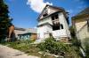 MIKAELA MACKENZIE / FREE PRESS FILES
                                A vacant house, which is scheduled to be demolished after it was damaged by fire for the third time in 18 months, in July.