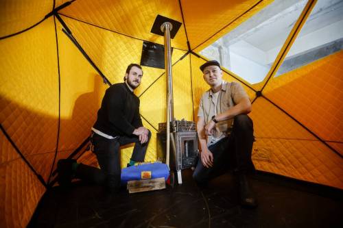 JOHN WOODS / FREE PRESS
                                Saunder Sauna Tents owners Anthony Kowalczyk, left, and Jonathan Dyck-Lyons in one of their sauna tents Tuesday.