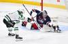 Fred Greenslade / THE CANADIAN PRESS
                                Jets&rsquo; goalie Eric Comrie makes a save on the Stars&rsquo; Sam Steel during first-period action Tuesday night in Winnipeg,