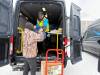 NICOLE BUFFIE / FREE PRESS
                                Volunteers from American online shopping giant Amazon delivered hampers to families Saturday morning.