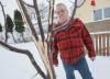 JOHN WOODS / FREE PRESS
                                Aurele Jack, a resident on Larsen Ave., is upset that snow plows damaged newly planted trees on his street in Sunday, December 28, 2025. reporter: aaron