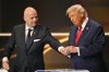 FIFA President Gianni Infantino pauses President Donald Trump during the draw for the 2026 soccer World Cup at the Kennedy Center in Washington, Friday, Dec. 5, 2025. (Mandel Ngan/Pool Photo via AP)