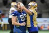 Winnipeg Blue Bombers quarterback Zach Collaros, right, jokes with Jake Thomas during football practice ahead of the 111th CFL Grey Cup, in Vancouver, B.C., Tuesday, Nov. 12, 2024. THE CANADIAN PRESS/Darryl Dyck