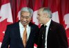 Prime Minister Mark Carney embraces Michael Ma, member of Parliament for Markham-Unionville, at the Liberal caucus holiday party in Ottawa on Thursday, Dec. 11, 2025. THE CANADIAN PRESS/Justin Tang