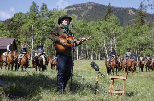 Singer Corb Lund, centre, sings on land proposed for coal mine development in the eastern slopes of the Livingstone range south west of Longview, Alta., Wednesday, June 16, 2021.THE CANADIAN PRESS/Jeff McIntosh