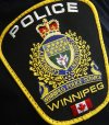 Photo of a Winnipeg Police Service shoulder badge on an officer in Winnipeg Tuesday, Nov. 5, 2019.  THE CANADIAN PRESS/John Woods