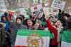 JOHN WOODS / WINNIPEG FREE PRESS
People gather to rally for the freedom of Iran at the Manitoba Legislature Sunday, January 11, 2026. 

reporter: eric