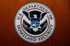 FILE - The Department of Homeland Security (DHS) seal during a news conference June 28, 2019, in Washington. (AP Photo/Carolyn Kaster, File)