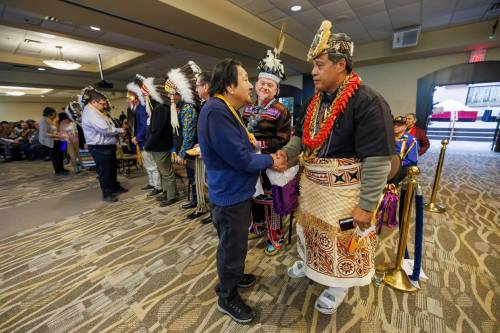 MIKE DEAL / FREE PRESS
                                Fred Harper, brother of Elijah Harper, shakes hands with Chief Tuifa&rsquo;asisina Vaeluaga Eli, who is from the Royal Family of Samoa.