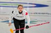 Canada's Jocelyn Peterman in action during the mixed doubles round robin phase of the curling competition against the United States at the 2026 Winter Olympics, in Cortina d'Ampezzo, Italy, Friday, Feb. 6, 2026. (AP Photo/Misper Apawu)