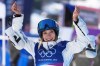 China's Eileen Gu celebrates competes during women's freestyle skiing slopestyle qualifications at the 2026 Winter Olympics, in Livigno, Italy, Saturday, Feb. 7, 2026. (AP Photo/Gregory Bull)
