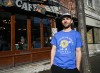 St-Viateur Bagel marketing director Benjamin Choquette wears a T-shirt with the company's logo in front of the Montreal shop on Thursday, Feb. 5, 2026. Actress Sophie Nélisse wore the shirt in an episode of Heated Rivalry. Graham Hughes/The Canadian Press