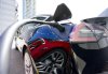 An electric vehicle is charged in Ottawa on Wednesday, July 13, 2022. THE CANADIAN PRESS/Sean Kilpatrick