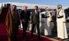Prime Minister Mark Carney, second from left, walks with Qatar's Minister of State for Energy Affairs Saad bin Sherida Al Kaabi, left, and Karim Morcos, Ambassador of Canada to Qatar, middle right, as he arrives in Doha, Qatar on Saturday, Jan. 17, 2026. THE CANADIAN PRESS/Sean Kilpatrick