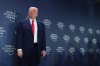 President Donald Trump stands on the stage prior to addressing a meeting of Global Business Leaders at the Annual Meeting of the World Economic Forum in Davos, Switzerland, Wednesday, Jan. 21, 2026. (AP Photo/Evan Vucci)