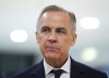 Prime Minister Mark Carney makes his way to take part in an event tilted 'Country Strategy Dialogue: Canada' as he attends the World Economic Forum in Davos, Switzerland on Tuesday, Jan. 20, 2026. THE CANADIAN PRESS/Sean Kilpatrick