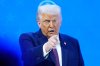 President Donald Trump reacts during a signing ceremony on his Board of Peace initiative at the Annual Meeting of the World Economic Forum in Davos, Switzerland, Thursday, Jan. 22, 2026. (AP Photo/Markus Schreiber)