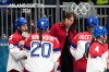 Czechia's Head Coach Carla Rae MacLeod is at the bench during a preliminary round match of women's ice hockey between United States and Czechia at the 2026 Winter Olympics, in Milan, Italy, Thursday, Feb. 5, 2026. (AP Photo/Petr David Josek)