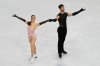 Laurence Fournier Beaudry and Guillaume Cizeron of France compete during the figure skating ice dance team event at the 2026 Winter Olympics, in Milan, Italy, Friday, Feb. 6, 2026. (AP Photo/Ashley Landis)