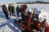 Pimicikamak Cree Nation Chief David Monias and Minister of Northern and Arctic Affairs Rebecca Chartrand talk during a tour with politicians and media at Pimicikamak Cree Nation, Man., on Wednesday, Jan. 7, 2026. THE CANADIAN PRESS/John