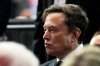 FILE - Elon Musk attends a memorial for conservative activist Charlie Kirk, Sunday, Sept. 21, 2025, at State Farm Stadium in Glendale, Ariz. (AP Photo/Julia Demaree Nikhinson, File)