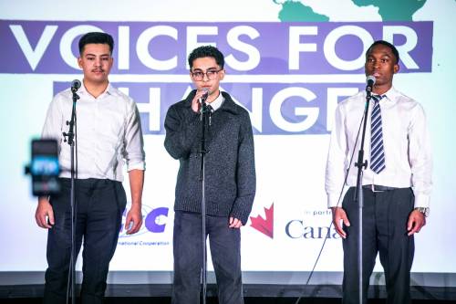 MIKAELA MACKENZIE / FREE PRESS
                                High school students Fawwaz (Ali) Al Hassan (left), Sami Suliman, and Tobi Olorunsola perform a spoken word poem they created which explores themes of genocide, oppression, and displacement, at the MCIC International Development Week kickoff at the Manitoba Legislature on Monday.
