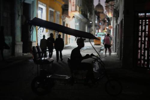 The Associated Press
                                A bicycle taxi travels at night in Havana, Cuba, on Jan. 6. U.S. control of Venezuelan oil is deepening the island&rsquo;s energy crisis.
