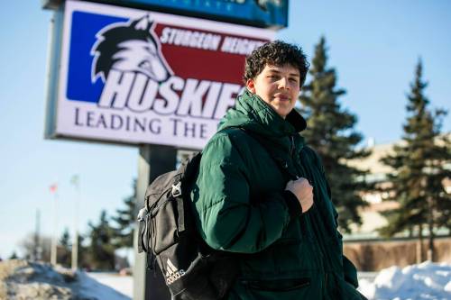 MIKAELA MACKENZIE / FREE PRESS
                                Sturgeon Heights Collegiate grade 12 student Hunter Mangin with his backpack on Monday. Sturgeon Heights students are lamenting new rules that require them to lock up their backpacks during classes.