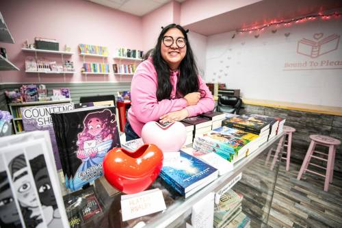 MIKAELA MACKENZIE / FREE PRESS
                                Bound to Please Books owner Dylan Yeun on Thursday, Feb. 12, 2026. For Malak story. Free Press 2026