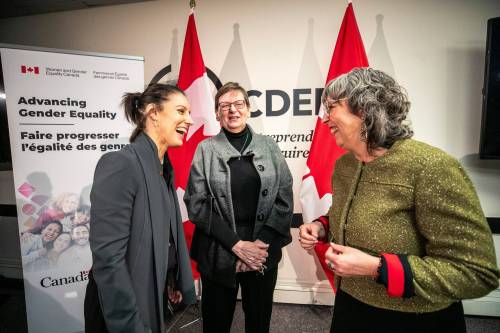 MIKAELA MACKENZIE / FREE PRESS
                                Quebec MP Marie-Gabrielle Ménard (from left), Eviance executive director Susan Hardie and Manitoba MP Ginette Lavack talk after a funding announcement Friday in Winnipeg.